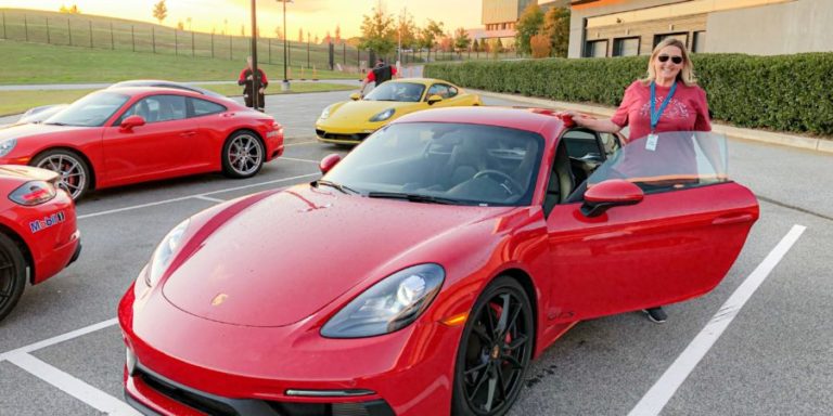 Red Porsche And Woman
