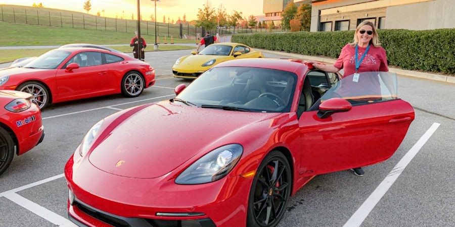 Red Porsche And Woman